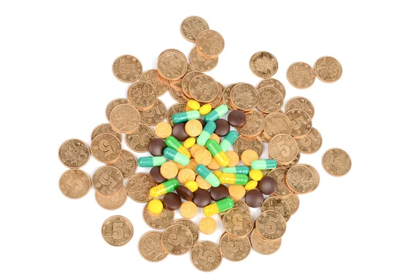 Medicina e moedas — Fotografia de Stock