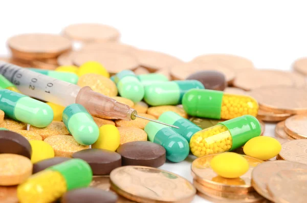 Medicina e moedas — Fotografia de Stock