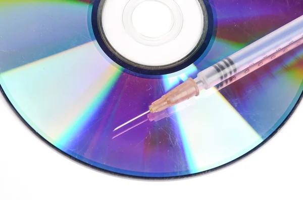 DVD και σύριγγα — Φωτογραφία Αρχείου