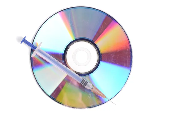 DVD и шприц — стоковое фото