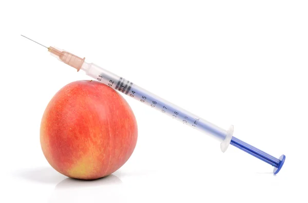 stock image Peach and syringe