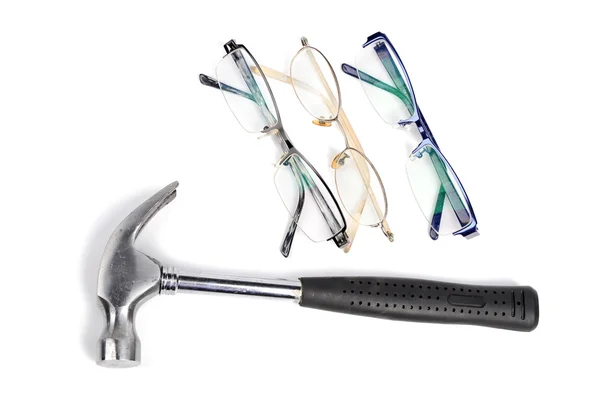 Hammer and eye glasses — Stock Photo, Image