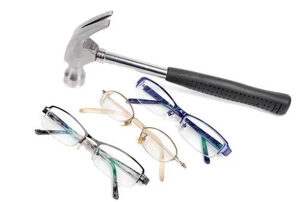 Hammer and eye glasses — Stock Photo, Image