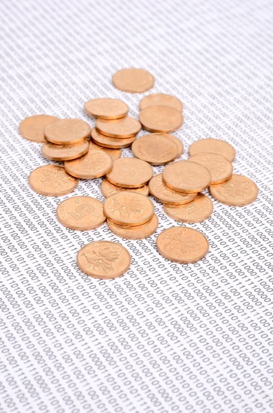 Coins on binary code — Stock Photo, Image