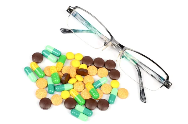 Eye glasses and medicine — Stockfoto