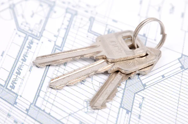 Key and house plan Royalty Free Stock Images