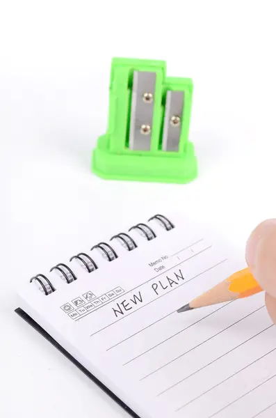Pencil,sharpener and notepad — Stock Photo, Image