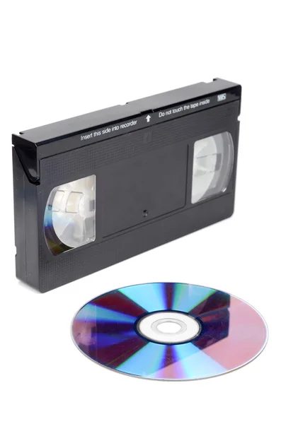 Video tape and DVD on white background — Stock Photo, Image