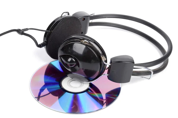 DVD і навушники на білому тлі — стокове фото