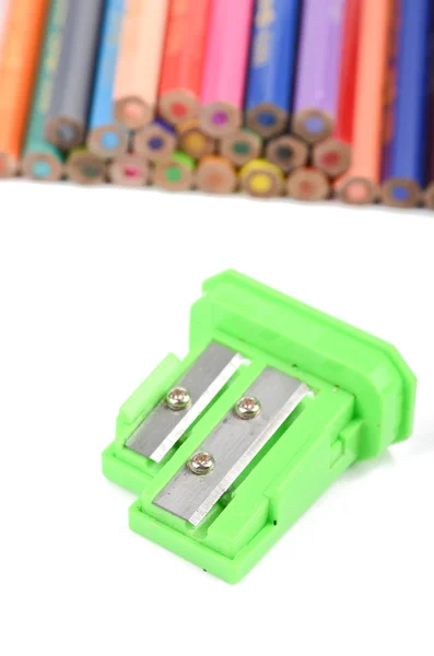 Color pencils and sharpener Stock Image