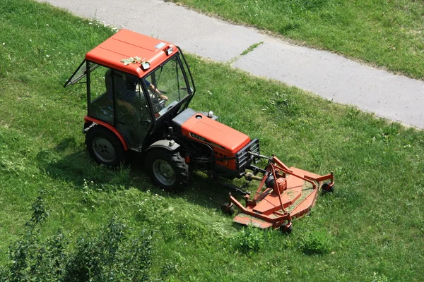 Traktor, Rasenmäher Stockbild