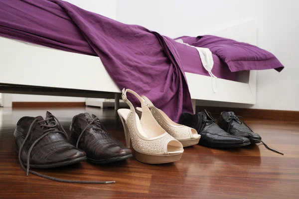 Buty w sypialni — Zdjęcie stockowe