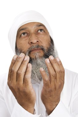 Arab Man praying clipart