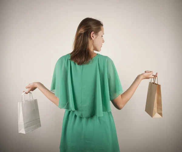 Girl with paper bags — Stock Photo, Image