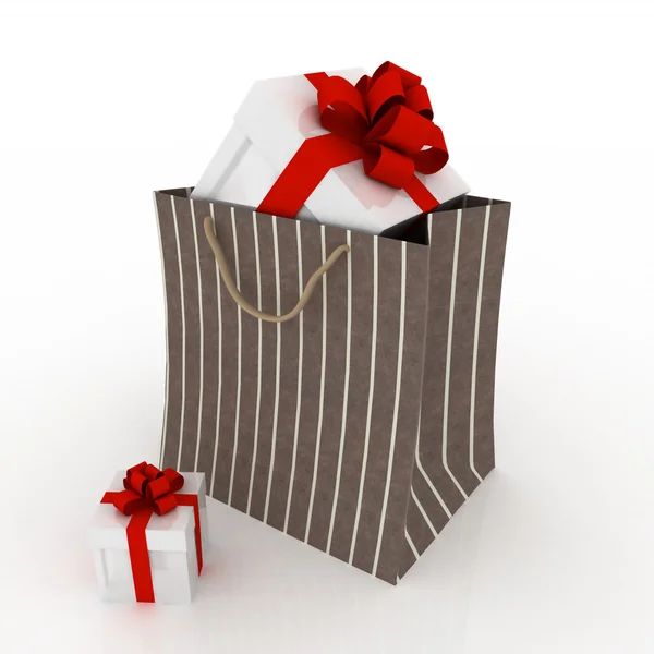 Подарочная коробка с красным бантом в мешке в подарок — стоковое фото