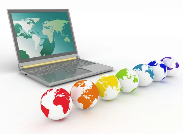 Laptop en globes van alle kleuren van de regenboog — Stockfoto