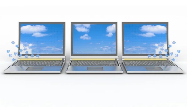 Three laptops with a screen from puzzle — Stock Photo, Image