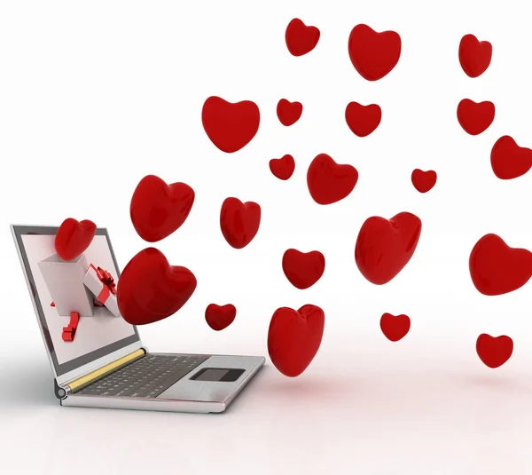 Hearts take off from the screen of laptop — Stock Photo, Image