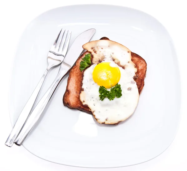 Meat loaf with fried egg on top — Stock Photo, Image