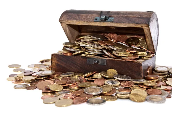 Treasure box on a heap of coins — Stock Photo, Image