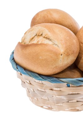 Small basket filled with buns on white clipart