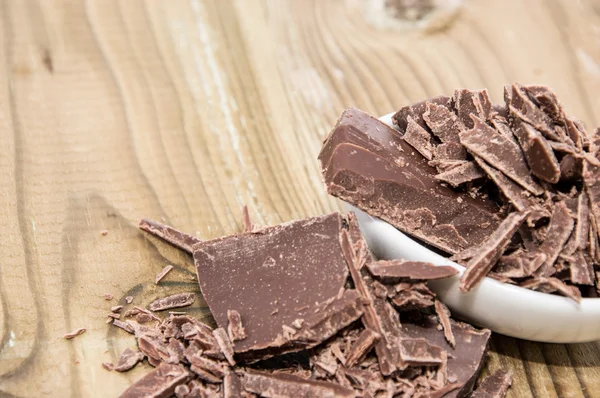 stock image Small bowl with Chocolate on wood