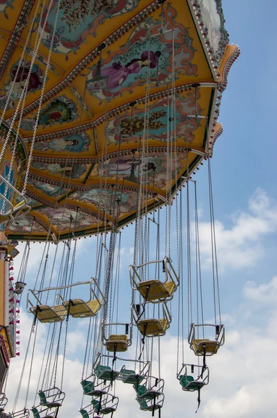 Chairoplane with clouds — Stock Photo, Image