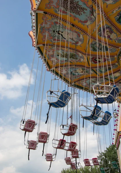 Chairoplane with clouds — Stock Photo, Image
