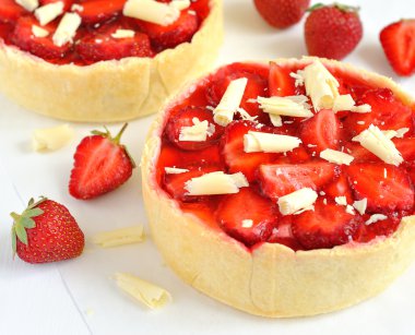 Tart with cream and strawberries clipart