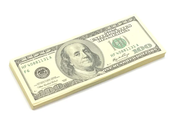 Dólares sobre un fondo blanco — Foto de Stock