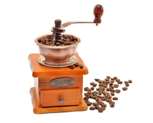 Handmatige koffiemolen en koffie bonen — Stockfoto
