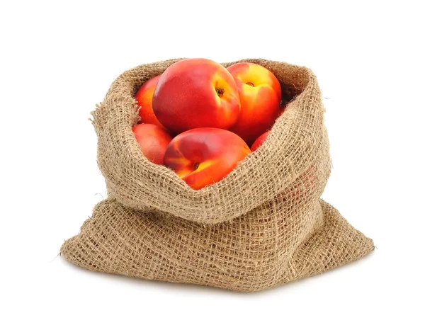 Nectarinas em um saco — Fotografia de Stock