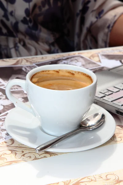 stock image Cup of coffee on the table