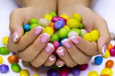 Candies in hands clipart