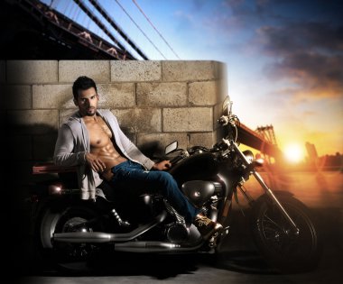 Sexy man on motorcycle clipart