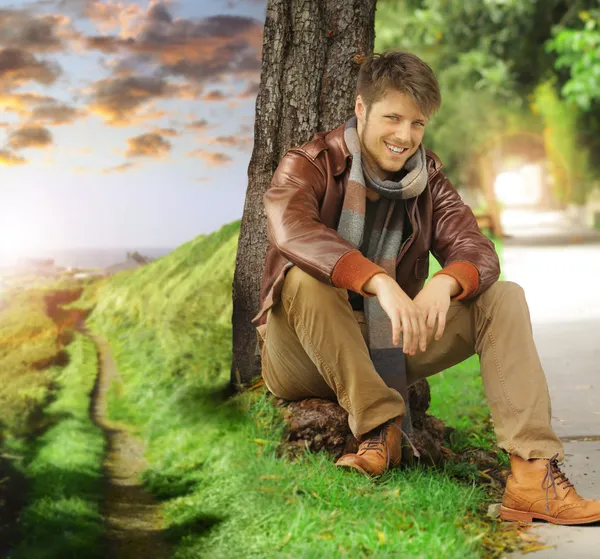 Young man in autumn — Stock Photo, Image