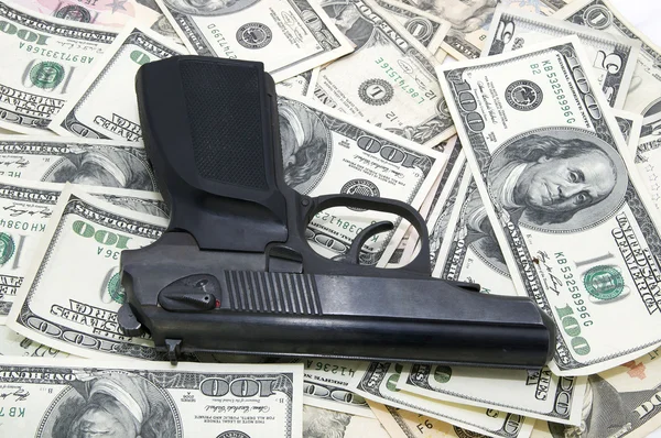 Όπλο και δολάρια — Φωτογραφία Αρχείου