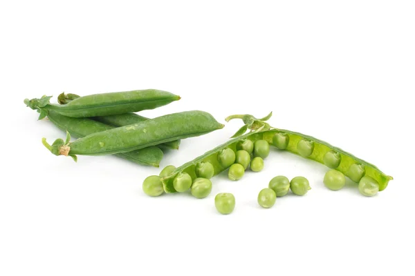 緑色のエンドウ豆の鞘とエンドウ豆 — ストック写真