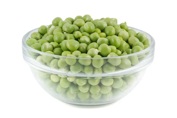 Green peas in a glass bowl. — Stock Photo, Image