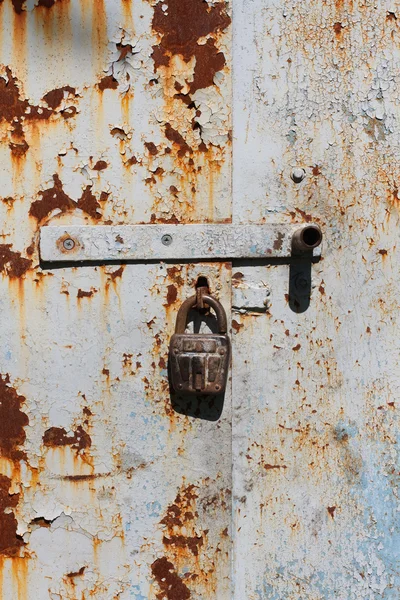 Rust, paint and old lock — Stock Photo, Image