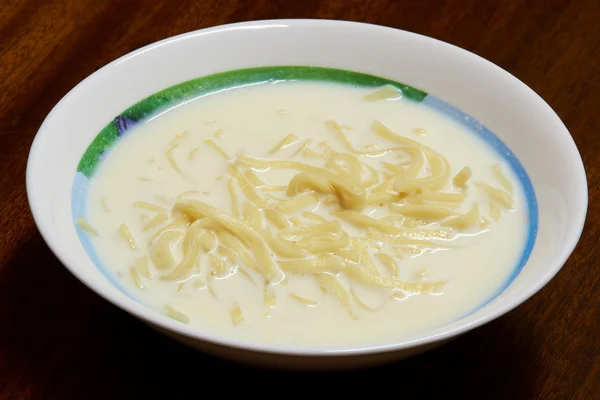 Stock image Noodles in milk