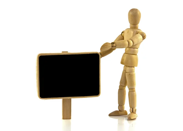 Wooden puppet with blackboard — Stock Photo, Image