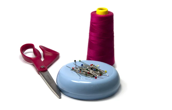 Sewing material with siccors and needles — Stock Photo, Image