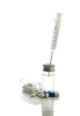 Medical needle in bottle and medicine clipart