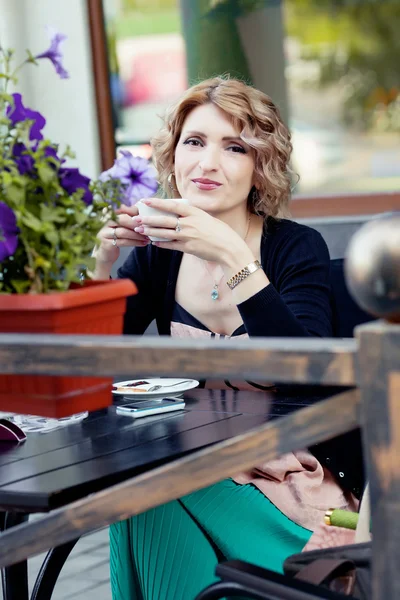 stock image Woman in summer cafe