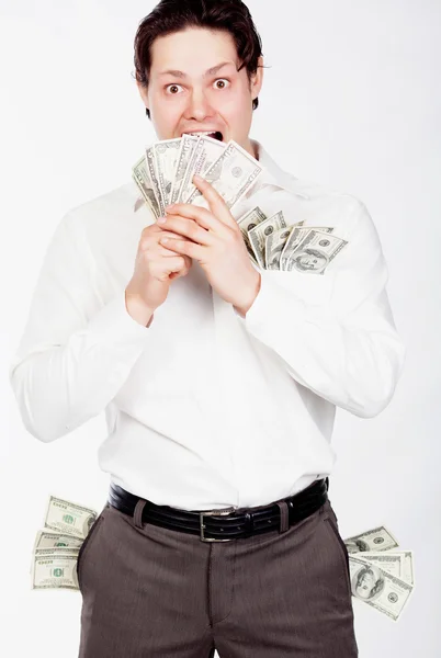 Mannen met dollars in zakken — Stockfoto