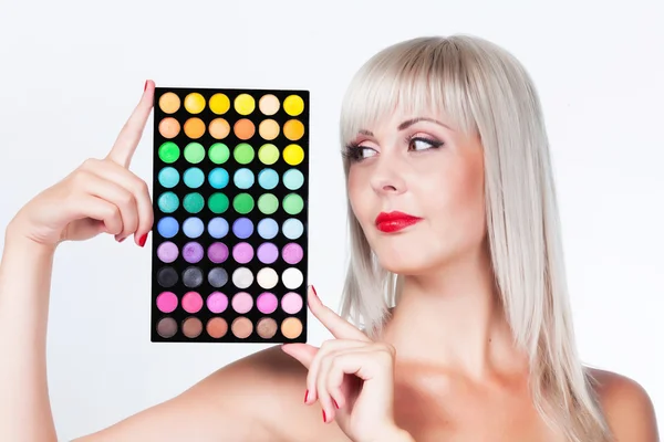 Girl with palette of eyeshadow. — Stock Photo, Image