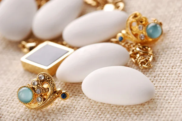 stock image Jordan almonds and jewelry