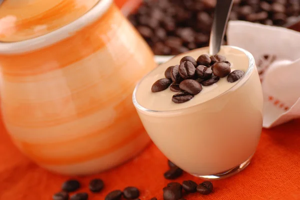 Yoghurt with coffee beans — Stock Photo, Image