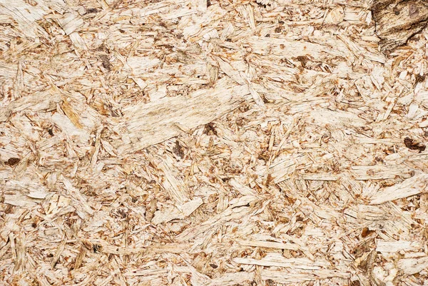 Κοντινό πλάνο μια συμπιεσμένη ξύλινη επιφάνεια της ανακύκλωσης — Φωτογραφία Αρχείου